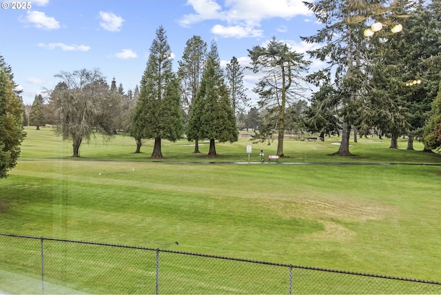 view of home's community with a lawn