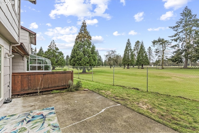 view of yard with a patio and a lanai