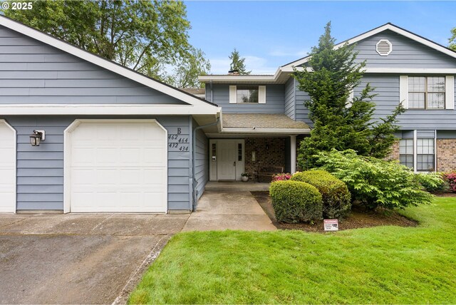 434 SW Eastman Pkwy, Gresham, OR 97080 - view of front facade with a front lawn, driveway, and a garage
