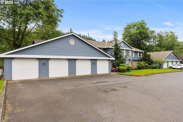 434 SW Eastman Pkwy, Gresham, OR 97080 - view of front facade featuring an outdoor structure and driveway