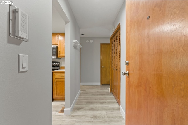 434 SW Eastman Pkwy, Gresham, OR 97080 - hallway featuring light wood-style flooring and baseboards