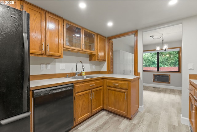 434 SW Eastman Pkwy, Gresham, OR 97080 - kitchen featuring black appliances, a sink, light countertops, light wood-type flooring, and recessed lighting