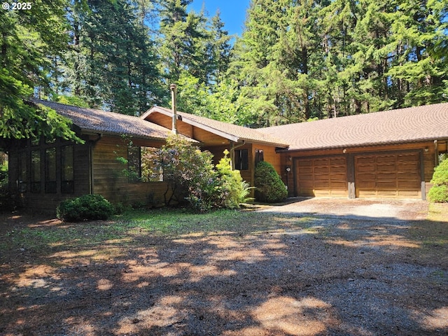 42250 Cedar Hollow Rd, Port Orford, OR 97465 - view of front of home with an attached garage and driveway