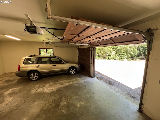 42250 Cedar Hollow Rd, Port Orford, OR 97465 - garage featuring a garage door opener