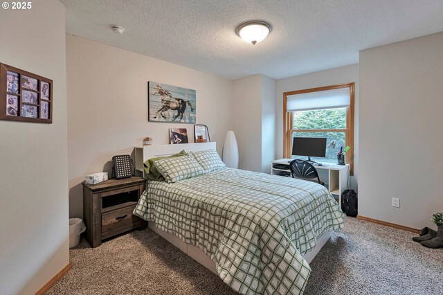 19642 SW 56th Ct, Tualatin, OR 97062 - bedroom featuring light carpet, baseboards, and a textured ceiling