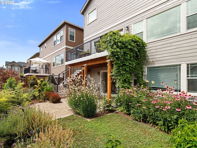 rear view of property with a patio