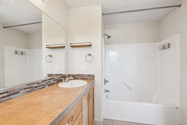 201 Selkirk Ln, Hood River, OR 97031 - bathroom with vanity,  shower combination, and decorative backsplash