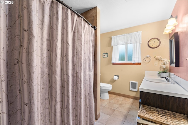 bathroom with vanity, a shower with curtain, tile patterned floors, and toilet