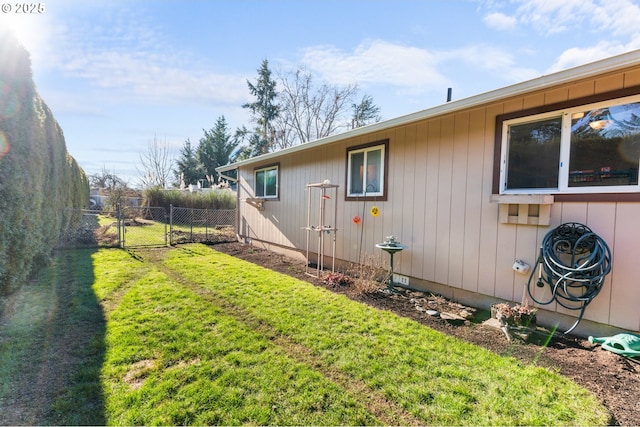 view of home's exterior featuring a yard