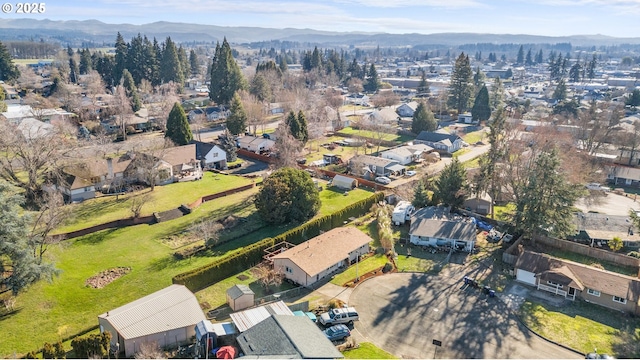 drone / aerial view featuring a mountain view