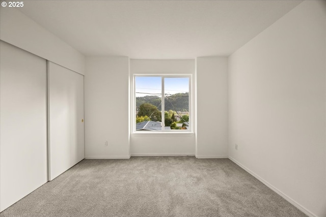 8527 N Princeton St, Portland, OR 97203 - unfurnished bedroom with carpet floors and a closet