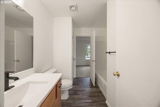 8527 N Princeton St, Portland, OR 97203 - full bathroom with vanity, wood finished floors, and a tub