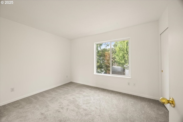 8527 N Princeton St, Portland, OR 97203 - unfurnished room with light colored carpet and baseboards