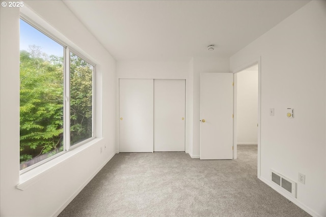 8527 N Princeton St, Portland, OR 97203 - unfurnished bedroom featuring carpet flooring and a closet