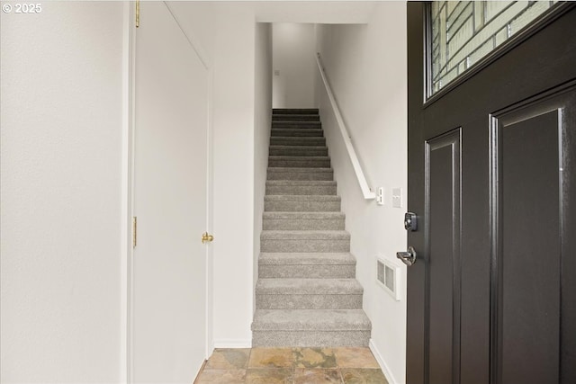 8527 N Princeton St, Portland, OR 97203 - stairway with baseboards and stone finish flooring