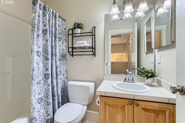 bathroom featuring vanity, shower / tub combo, a chandelier, and toilet