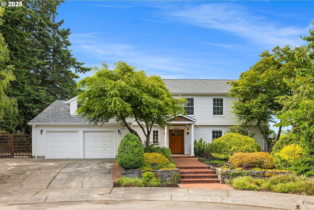 6322 Pony Ct, West Linn, OR 97068 - view of front facade featuring a garage, concrete driveway, and roof with shingles