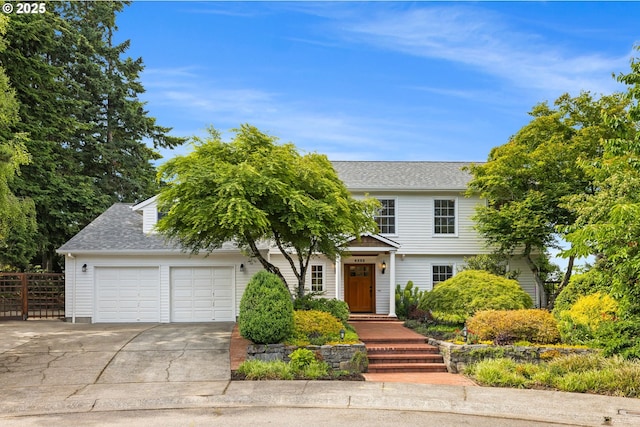 6322 Pony Ct, West Linn, OR 97068 - view of front facade featuring a garage, concrete driveway, and roof with shingles