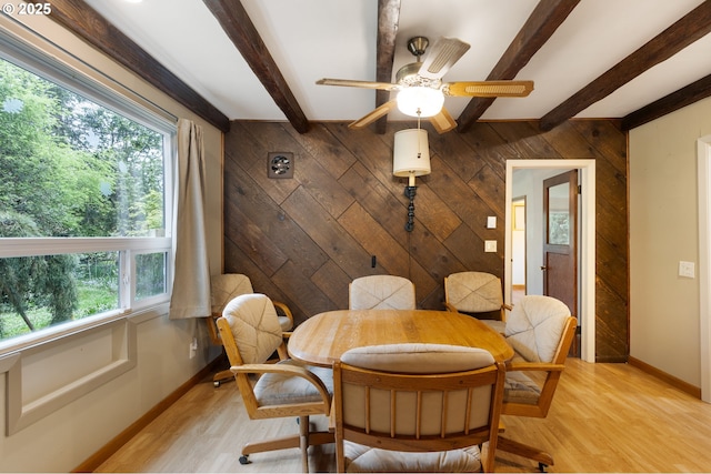 939 Buckhorn Rd, Roseburg, OR 97470 - dining room with wooden walls, beamed ceiling, ceiling fan, and light wood-style floors