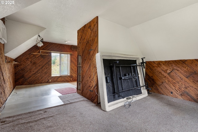 939 Buckhorn Rd, Roseburg, OR 97470 - bonus room featuring wood walls, vaulted ceiling, and carpet floors