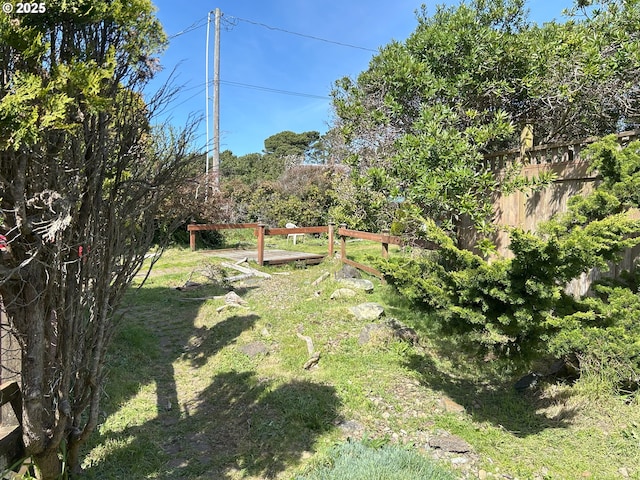 view of yard featuring fence
