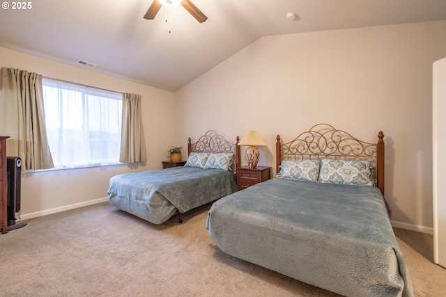 bedroom with vaulted ceiling, carpet, ceiling fan, and baseboards