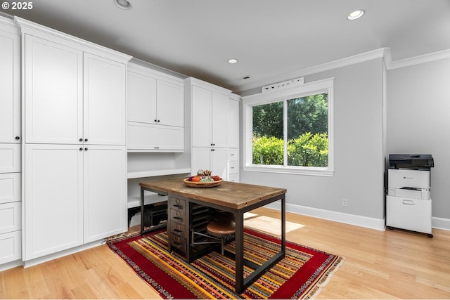 office area featuring baseboards, crown molding, light wood-type flooring, and recessed lighting