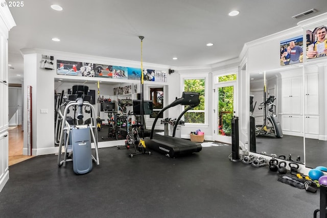 workout area featuring ornamental molding, recessed lighting, and baseboards