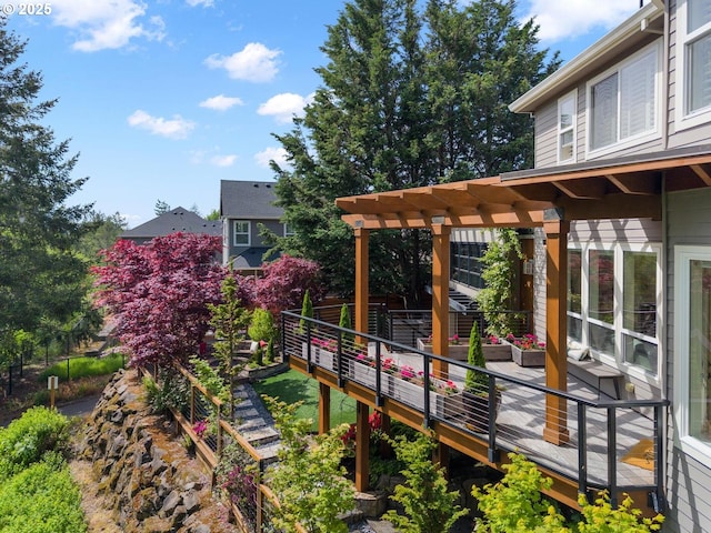 view of yard with a pergola and a wooden deck