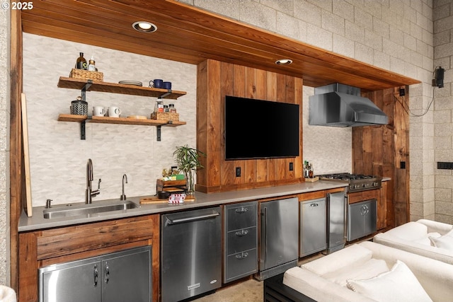 indoor wet bar featuring wall chimney exhaust hood, stainless steel appliances, and recessed lighting