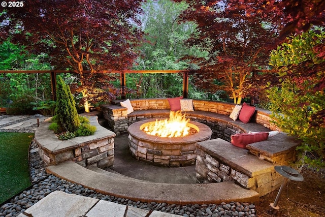 view of patio / terrace with a fire pit