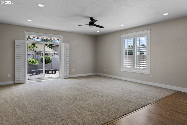 705 NW 25th Ave, Battle Ground, WA 98604 - spare room with a ceiling fan, baseboards, wood finished floors, a textured ceiling, and recessed lighting