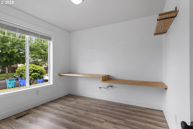 705 NW 25th Ave, Battle Ground, WA 98604 - spare room featuring wood finished floors and baseboards