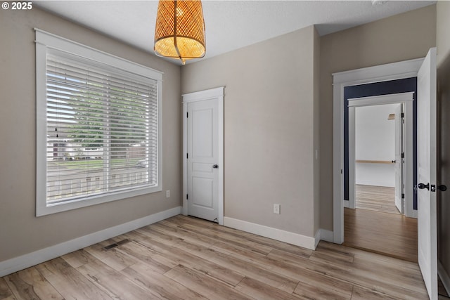 705 NW 25th Ave, Battle Ground, WA 98604 - unfurnished bedroom featuring light wood-type flooring and baseboards