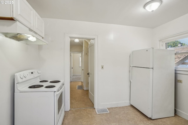 kitchen with visible vents, under cabinet range hood, white cabinets, and white appliances