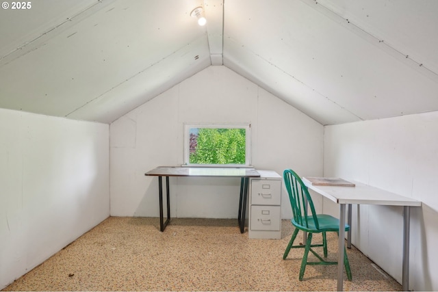 office area with vaulted ceiling
