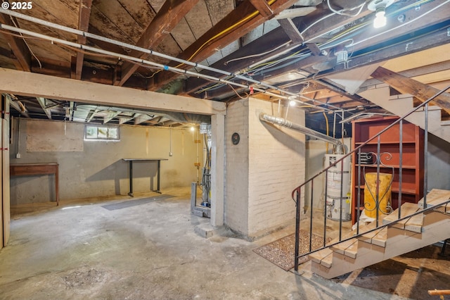 below grade area featuring water heater and stairs