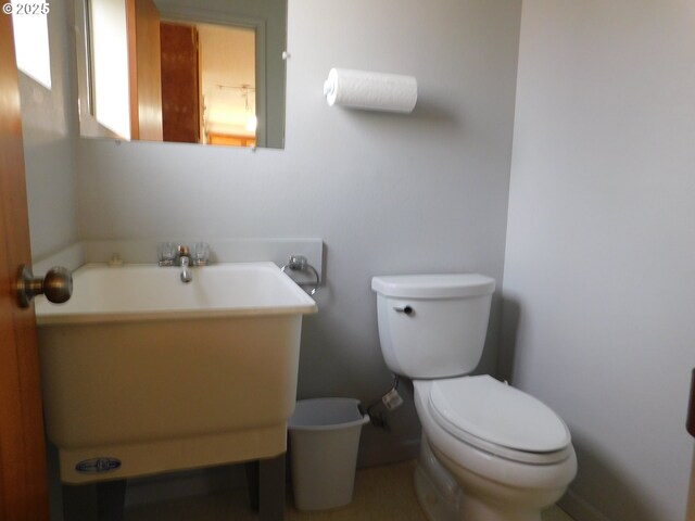 bathroom featuring toilet