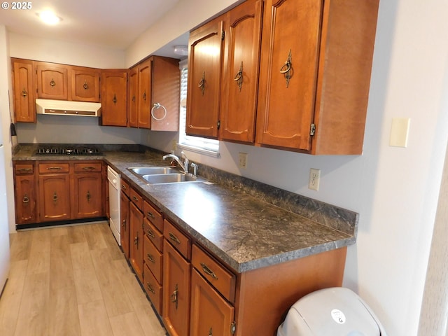 kitchen with dishwasher, sink, light hardwood / wood-style floors, and black gas cooktop