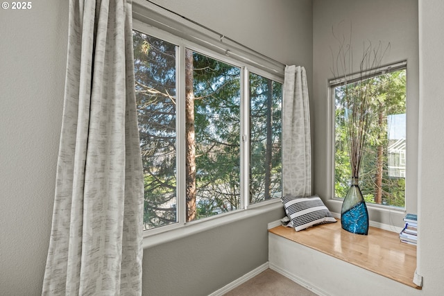 sunroom featuring a wealth of natural light