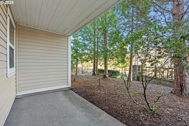 view of yard with a patio and fence