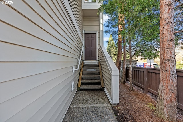 property entrance with fence