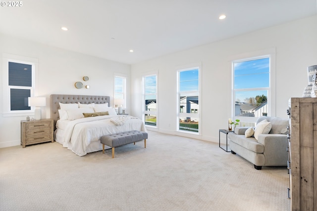 bedroom with light carpet