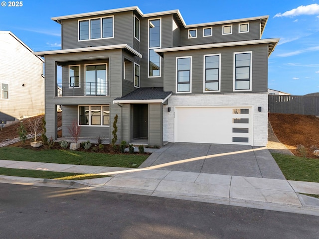 view of front of property with a garage