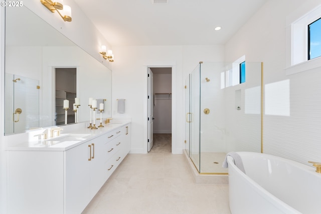 bathroom featuring vanity, tile patterned floors, and independent shower and bath