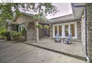 17130 Eastwood Ln, Brookings, OR 97415 - view of patio featuring french doors