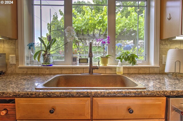 17130 Eastwood Ln, Brookings, OR 97415 - kitchen view of a sink and decorative backsplash