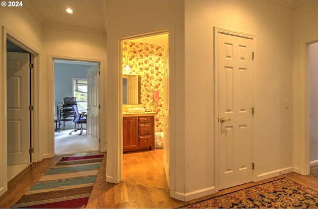 17130 Eastwood Ln, Brookings, OR 97415 - hall with ornamental molding, light wood-type flooring, and baseboards