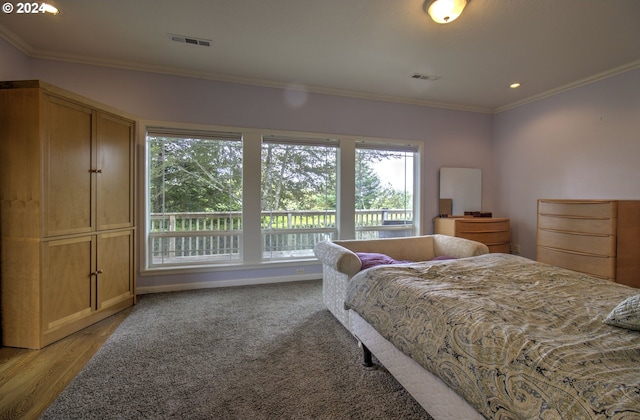 17130 Eastwood Ln, Brookings, OR 97415 - bedroom featuring ornamental molding, recessed lighting, and light wood-type flooring