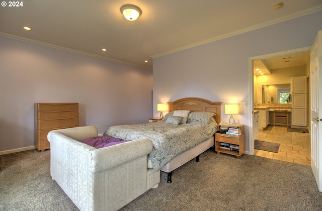 carpeted bedroom featuring connected bathroom and crown molding